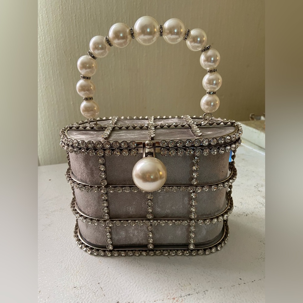 Silver pearl clutch bag
